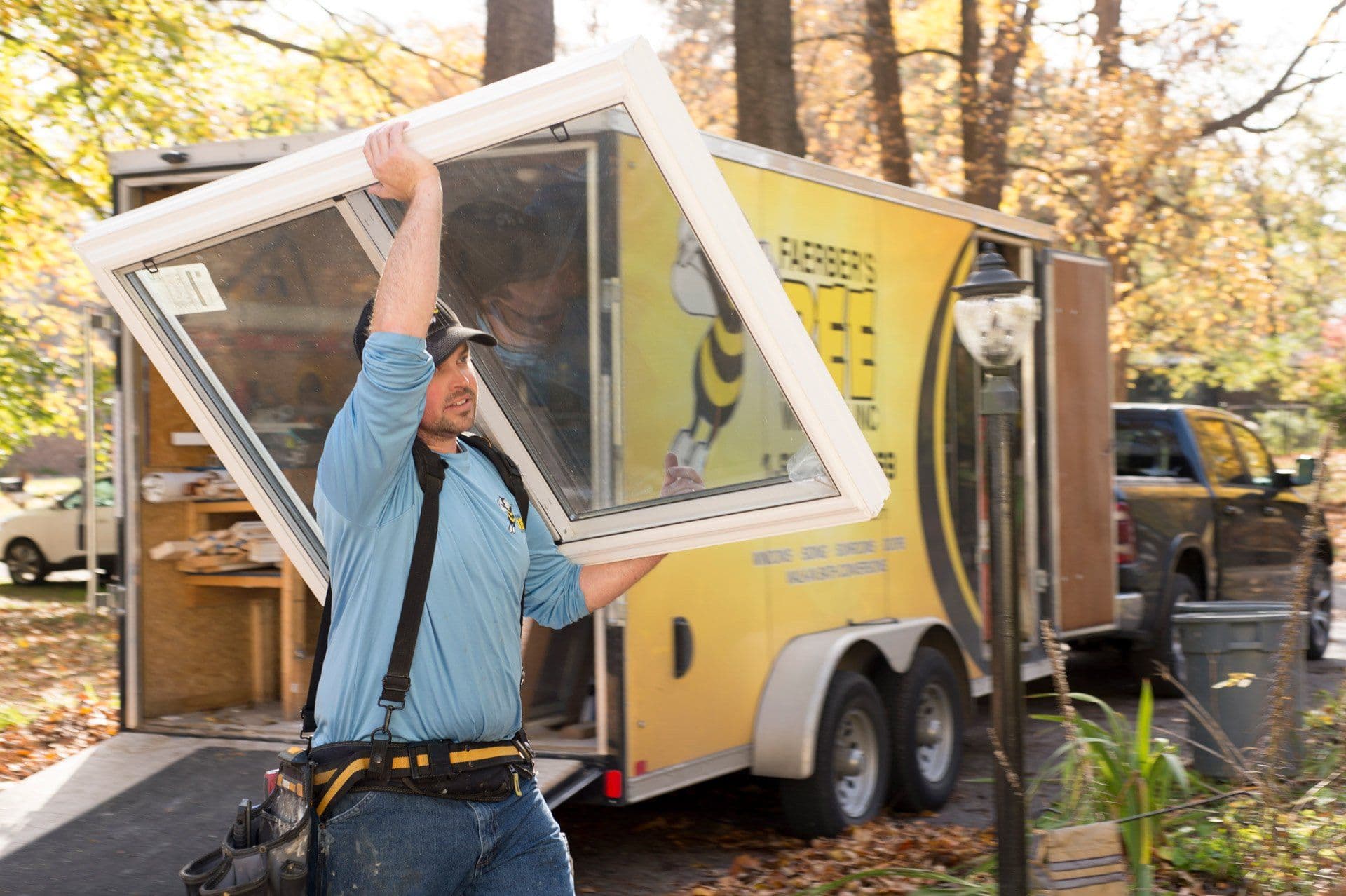 Worker carrying window